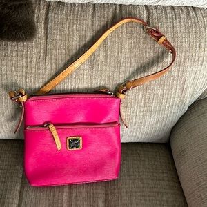 Dooney and Burke pebbled pink raspberry Crossbody bag 9 x 8”